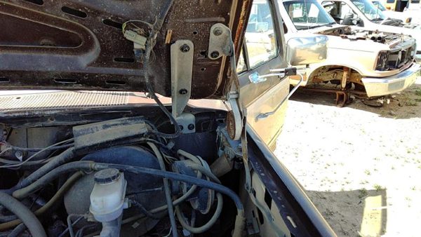 1988 Ford F150 Hood Hinge LH Brown — photo 1