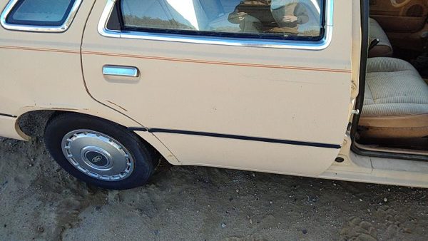 1984 Ford Tempo Rear Door RH Tan — photo 1