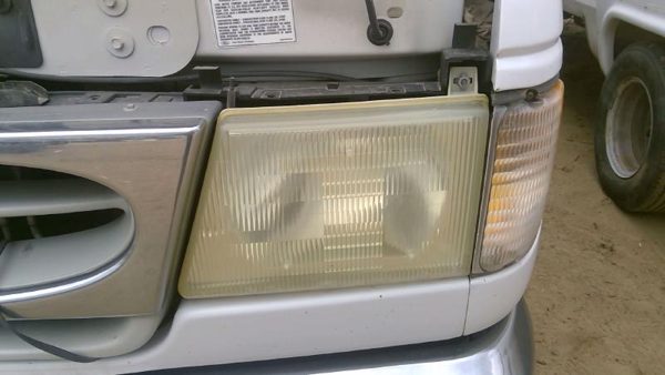 2002 Ford E-350 Super Duty Headlamp Assembly Van E450 LH — photo 1