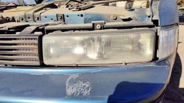 1989 Oldsmobile Cutlass Supreme Headlamp Assembly LH — photo 1