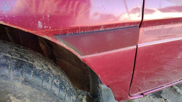 1997 Ford Aspire Fender Moulding LH E5 Red — photo 3