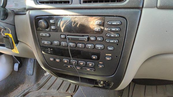 2000 Ford Taurus Radio Bezel Trim — photo 3