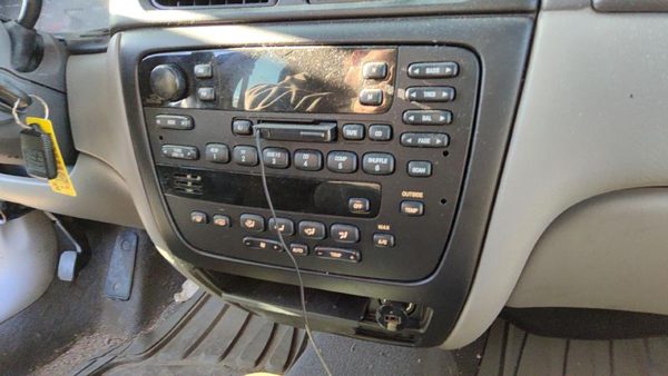 2000 Ford Taurus Radio Bezel Trim — photo 4