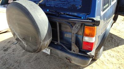 94-95 Nissan Pathfinder Rear Corner Mounted Spare Tire Carrier Oem Back