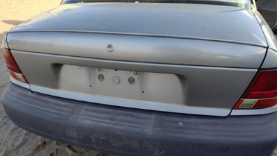 1996-1999 Saturn Sl1 License Plate Trim Surround Panel Tail Trunk Finish Silver