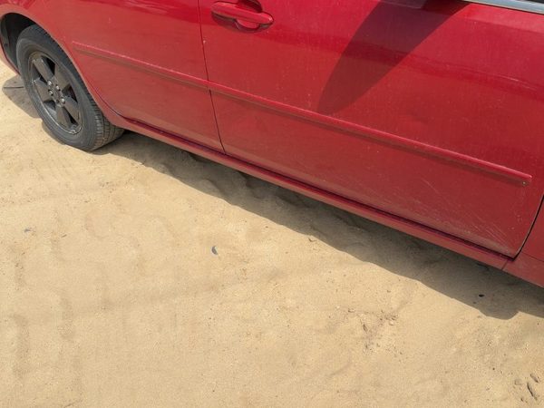 06-08 Impala Passenger Right Lower Rocker Panel Moulding Oem Precision Red 27U — photo 1